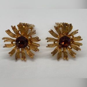 Vintage Glass Topaz Amber colored floral clip on earrings. Unsigned & untested .